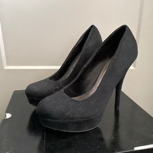Black size 8.5, only worn once. Needless to say I can’t walk in heels
